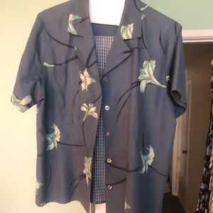 Blue floral print button up shirt.